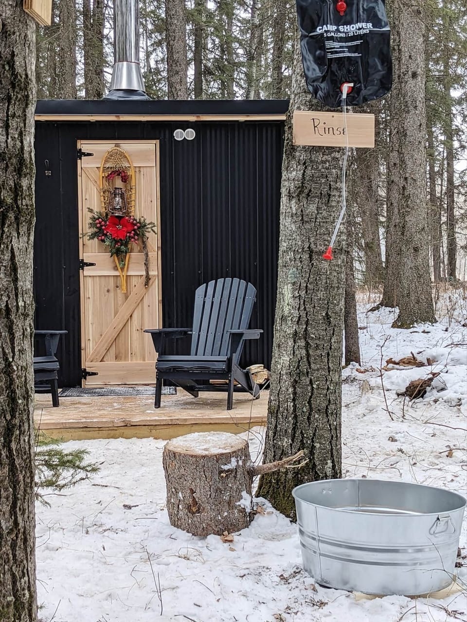 Outdoor camp shower to rinse after sauna 