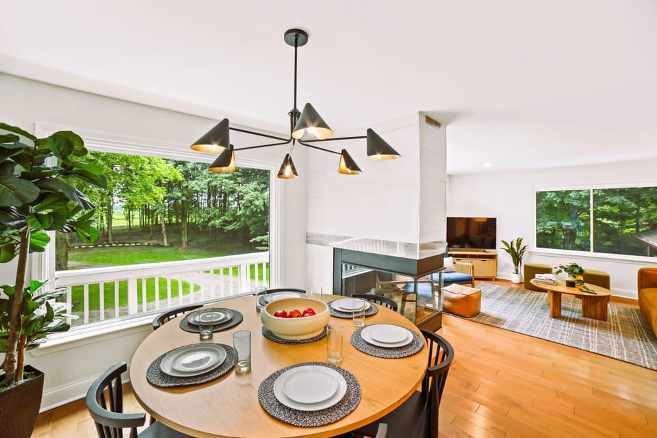 6 seat dining room table and 2 additional seats at the island