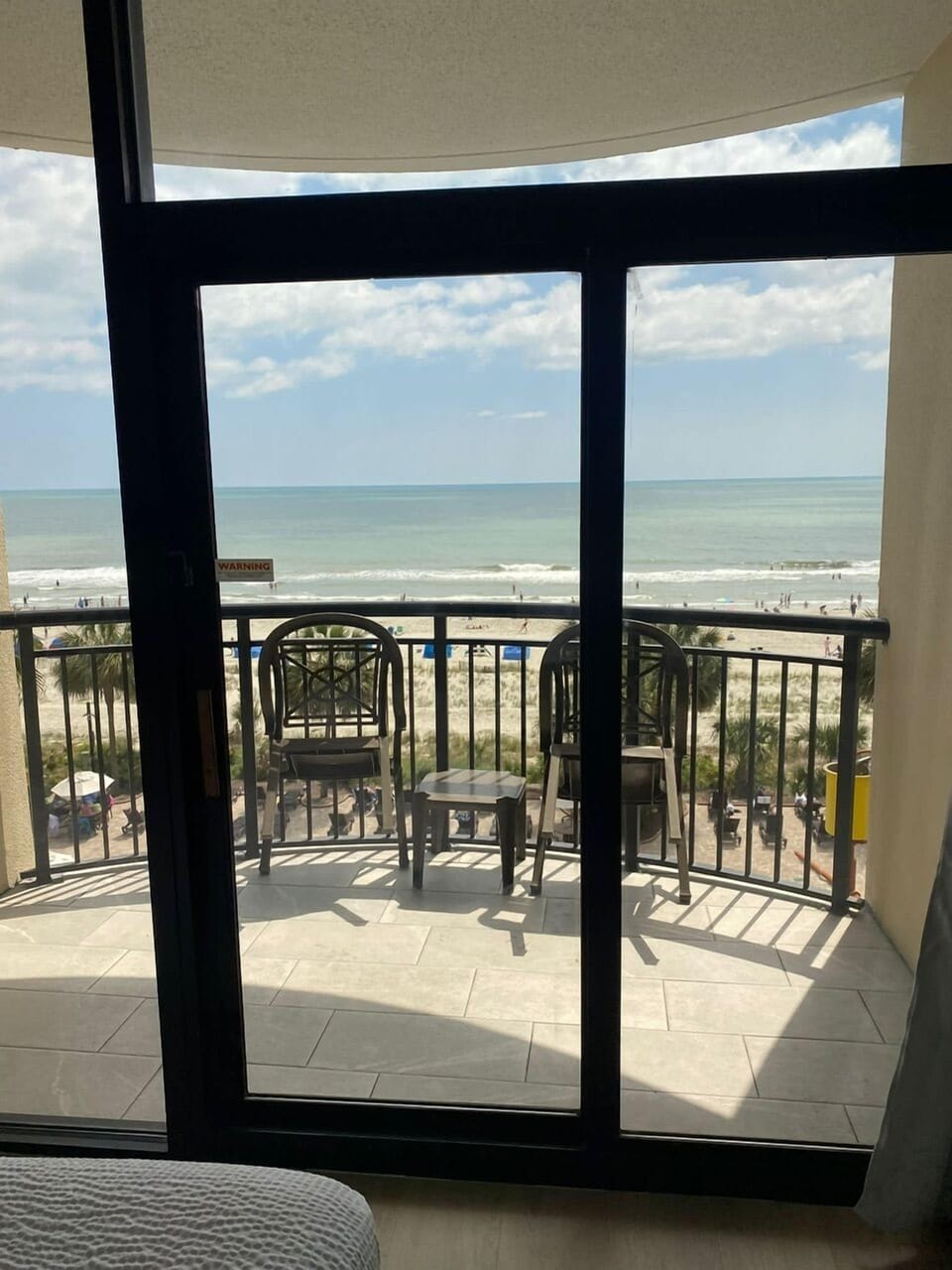 Ceiling to floor windows gives you a fantastic view of the ocean from top floor!