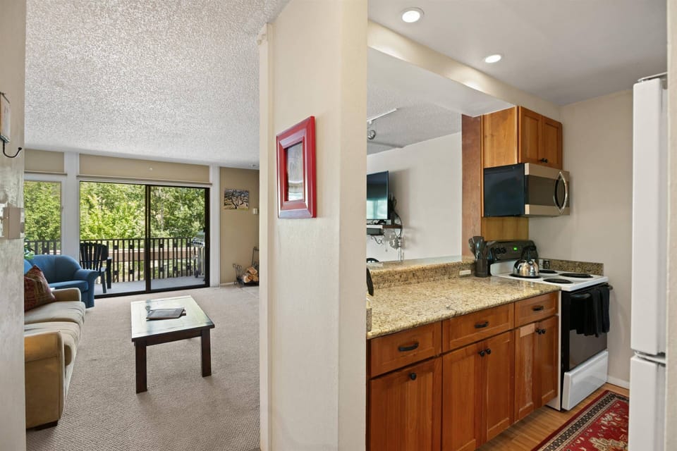 The kitchen is fully stocked with everything you need to enjoy dining at home during your vacation in Snowmass