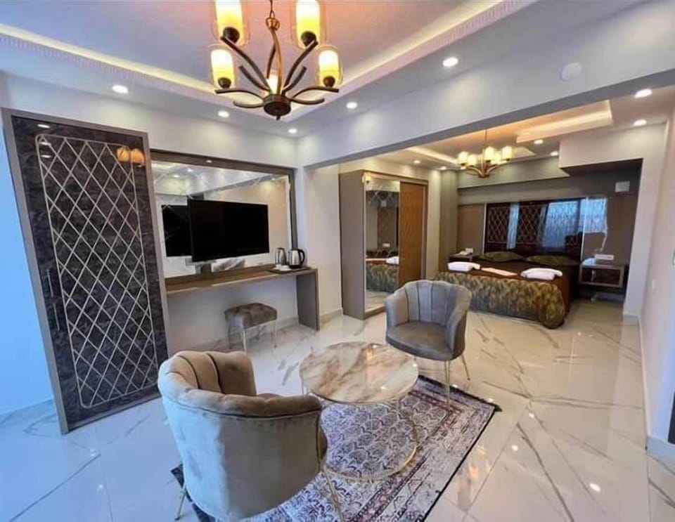 Deluxe Suite, Balcony, Sea View | In-room safe, blackout drapes, free WiFi