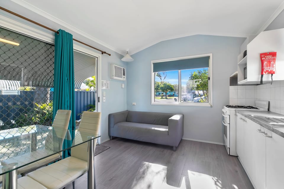 Standard Studio | Living area | 32-inch flat-screen TV with digital channels
