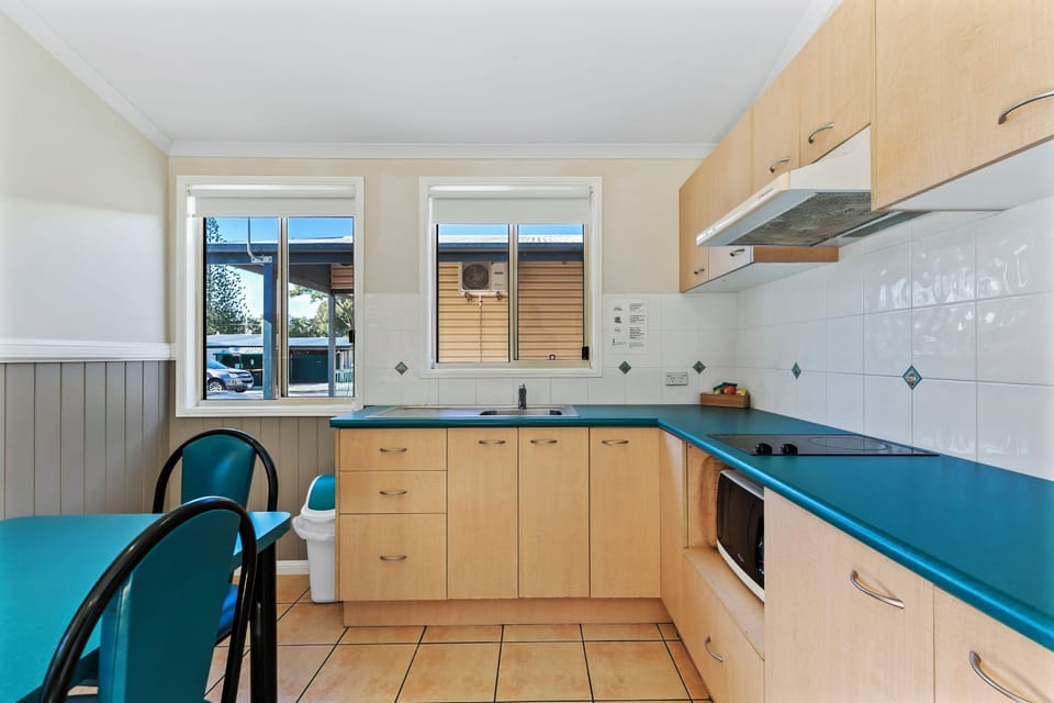 Full-size fridge, microwave, stovetop, toaster