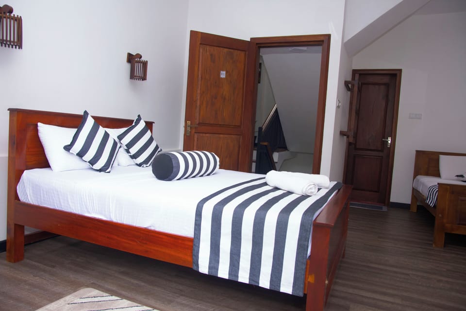 Deluxe Triple Room, Balcony | Free WiFi