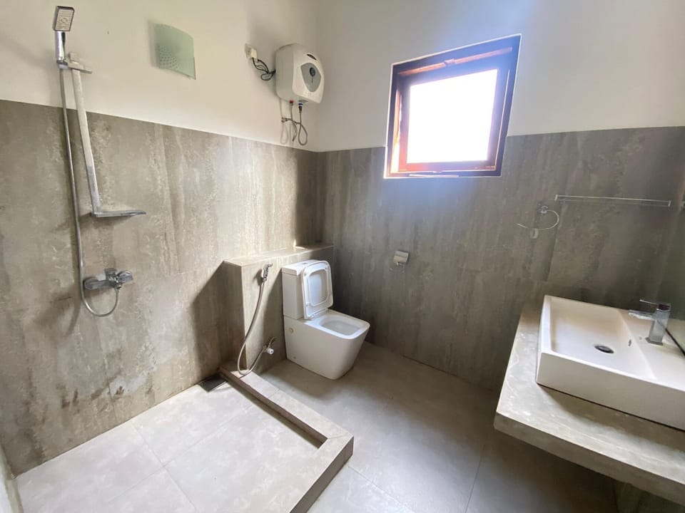 Shower, towels, soap, toilet paper