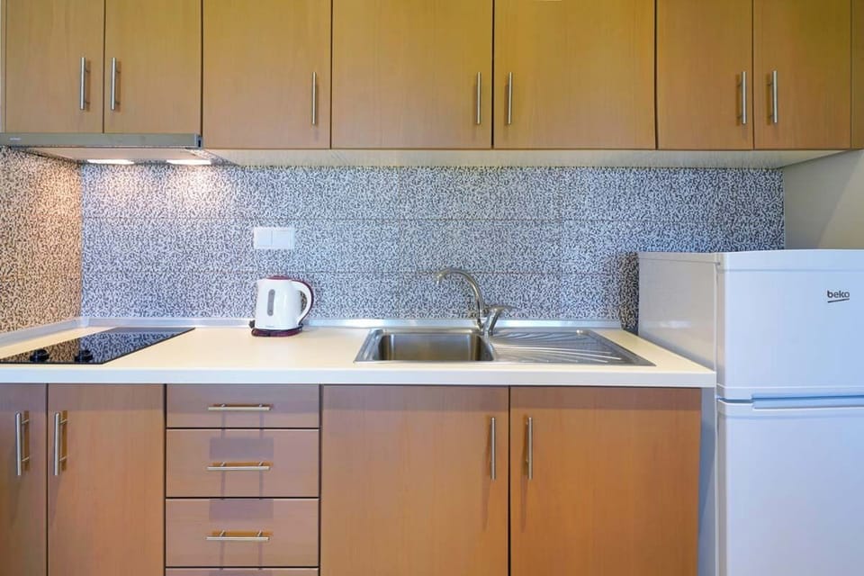 Classic Double Room, Partial Sea View | Private kitchen | Full-size fridge, stovetop, espresso maker, electric kettle