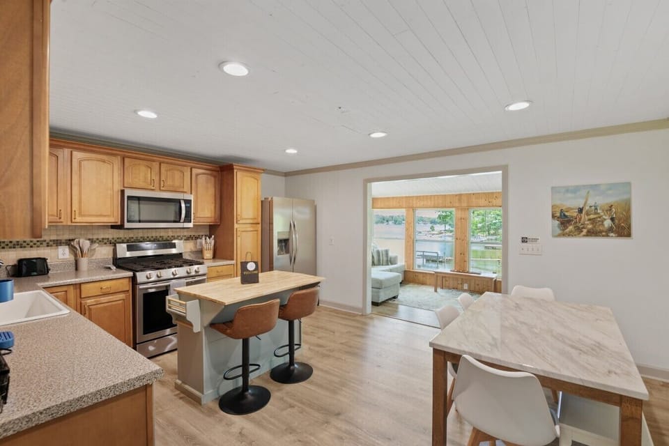 Kitchen and dining area, leading into the sun room