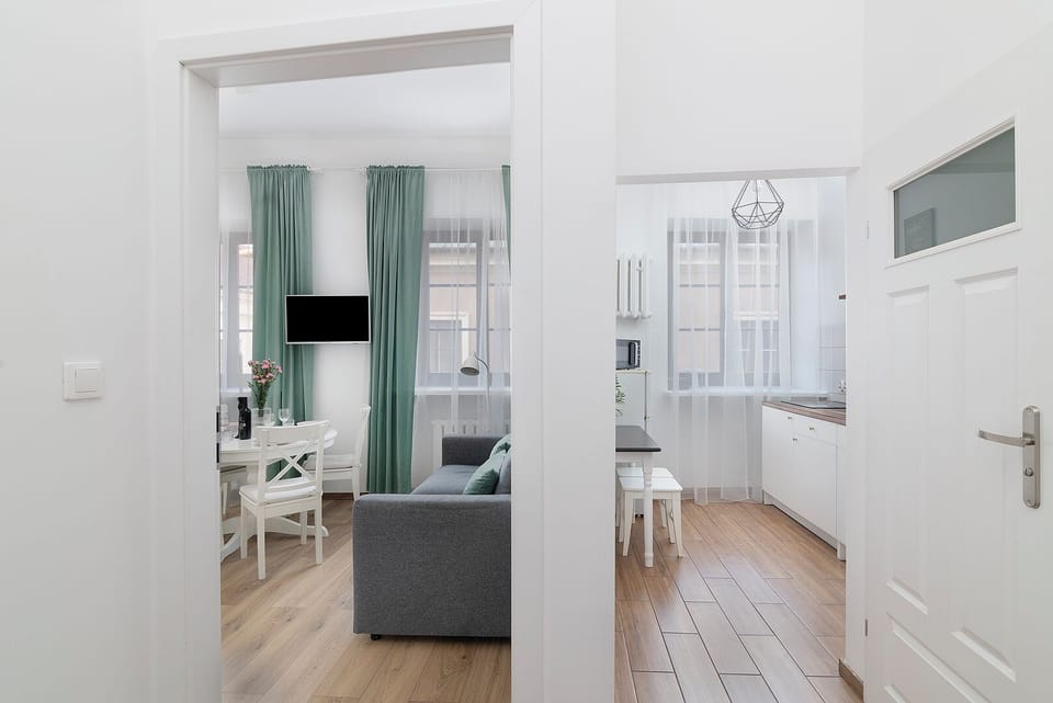 Comfort Apartment, City View | Living area | Flat-screen TV