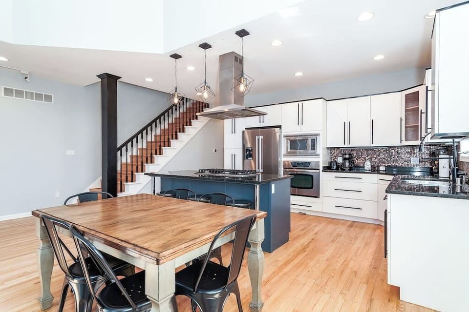 Living Room / Dining Room / Kitchen Combo (kitchen is fully stocked with 3 counter height stools at island)
