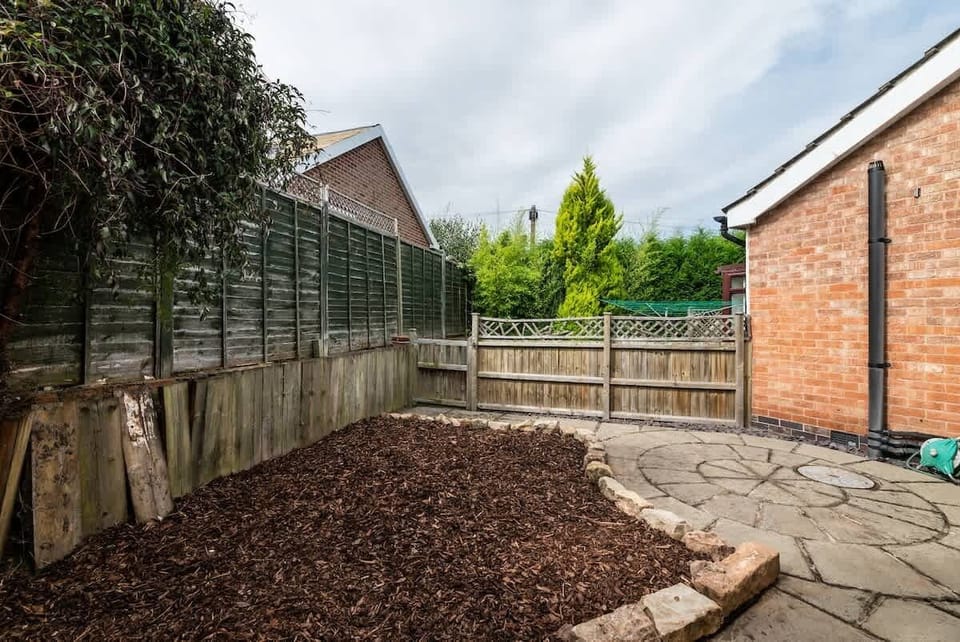 A breath of fresh air — a spacious back garden perfect for relaxing, unwinding, or enjoying the outdoors.