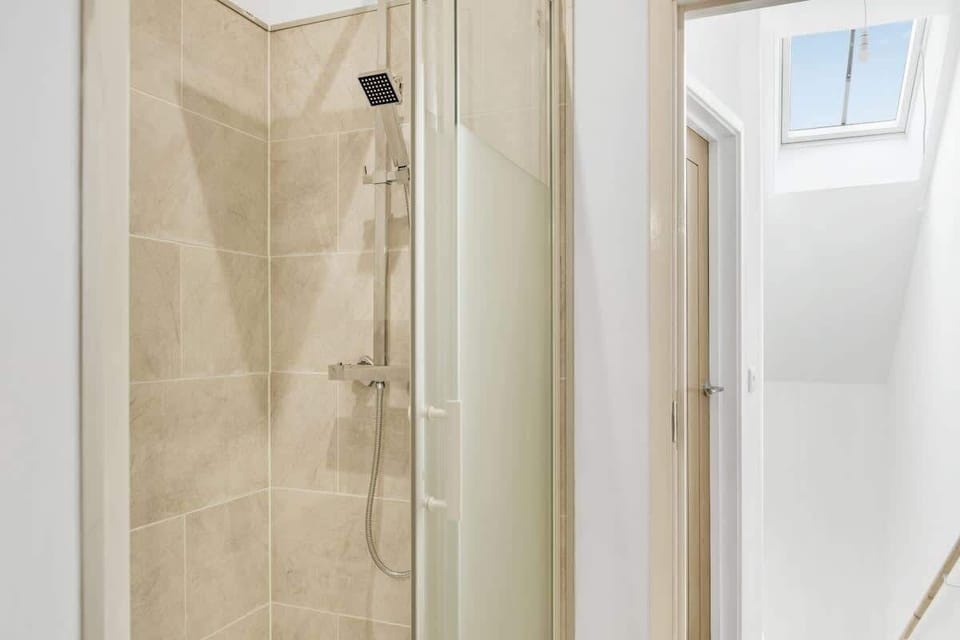 "Indulge in comfort with a full bathroom featuring a spacious tub—perfect for unwinding after a long day."