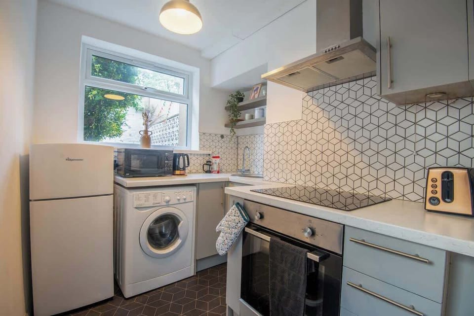 "Everything you need, right where you need it — a simple yet complete kitchen for effortless cooking and comfort."