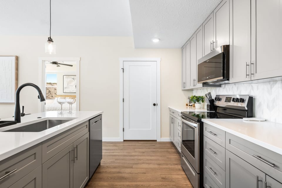 Condo, 2 Bedrooms | Private kitchen | Fridge, oven, coffee/tea maker, toaster