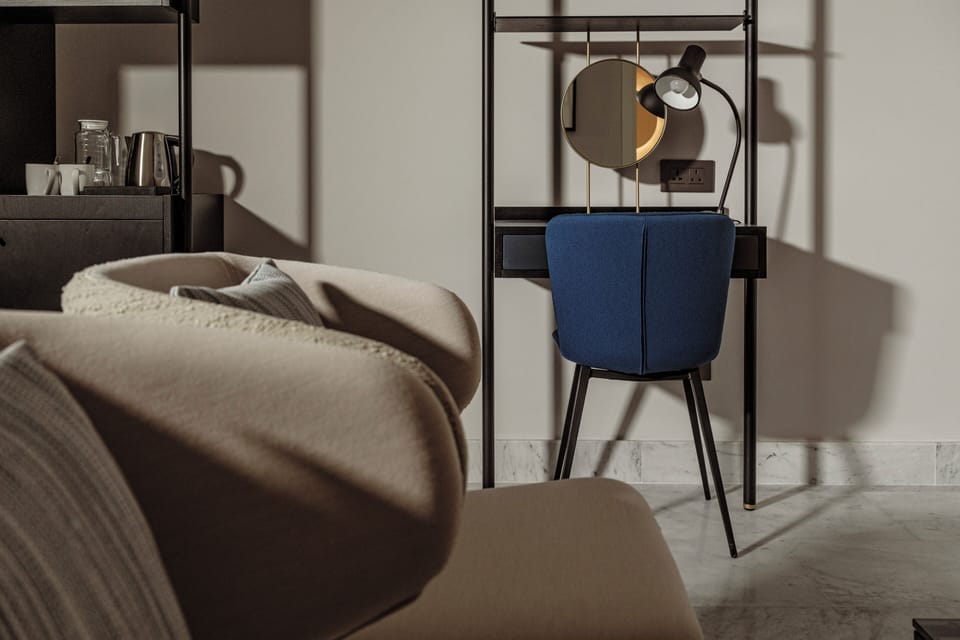 Deluxe Triple Room, Courtyard View | Premium bedding, minibar, in-room safe, desk