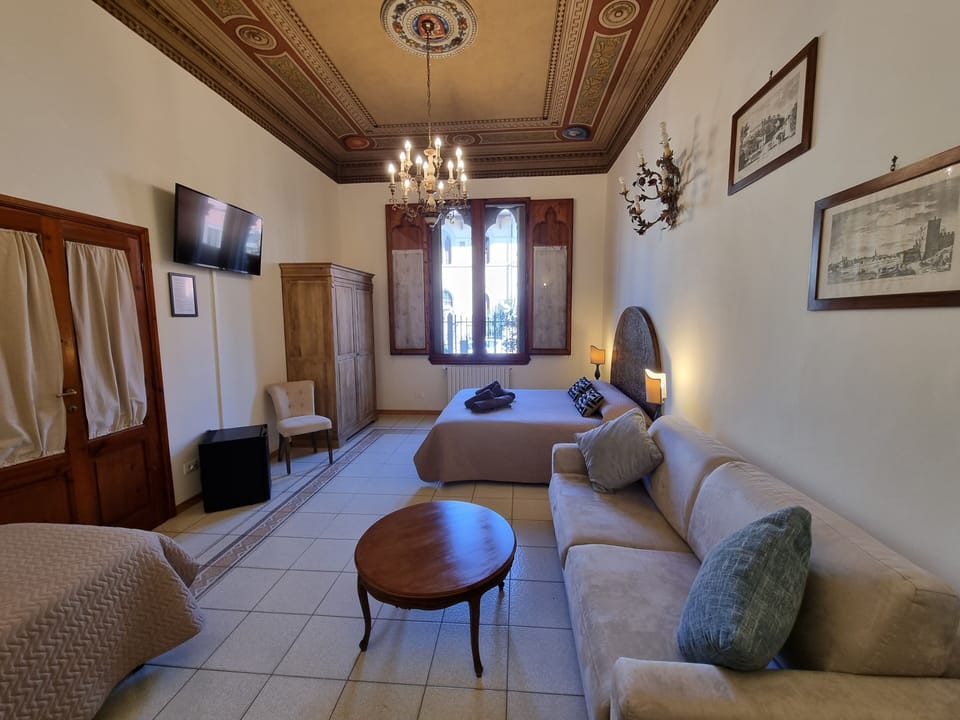Quadruple Room, Courtyard View | Individually furnished, iron/ironing board, free WiFi, bed sheets