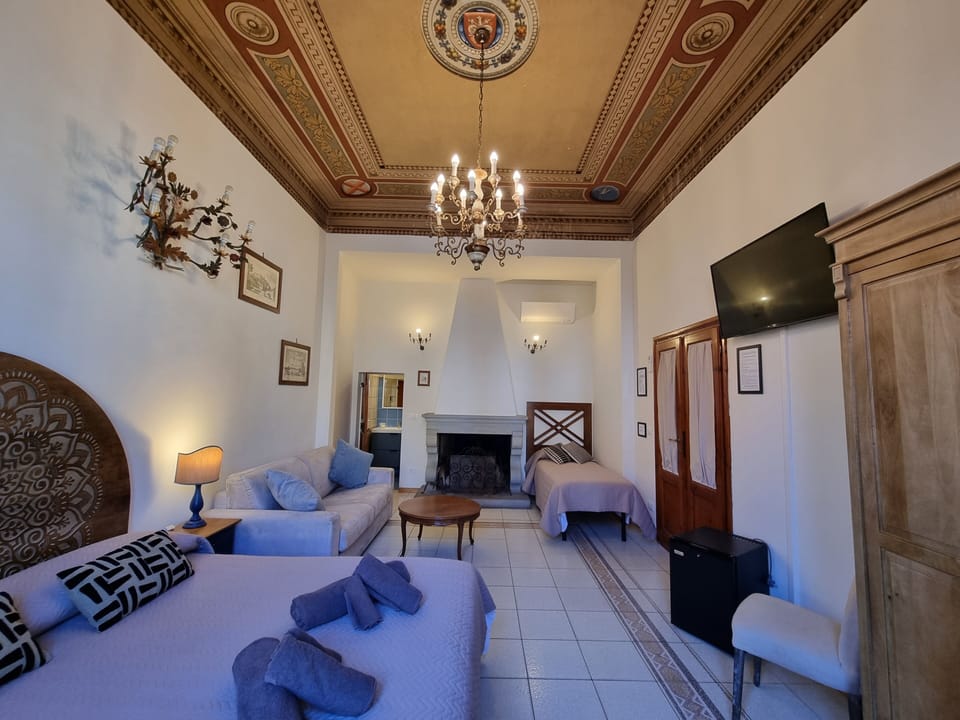 Quadruple Room, Courtyard View | Individually furnished, iron/ironing board, free WiFi, bed sheets