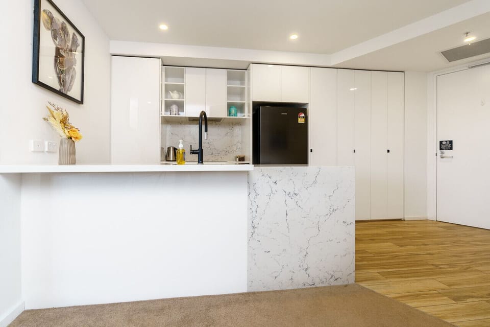 Our modern kitchen comes with all the essential appliances, making meal preparation convenient and enjoyable during your stay.