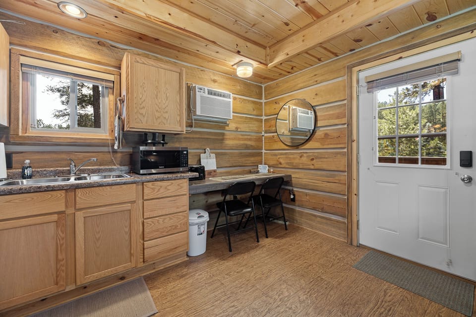 Kitchen includes toaster over and cooktop