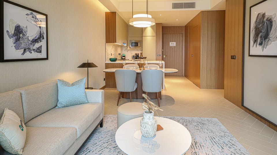 Deluxe Apartment, Balcony, City View | Living area | 50-inch Smart TV with cable channels