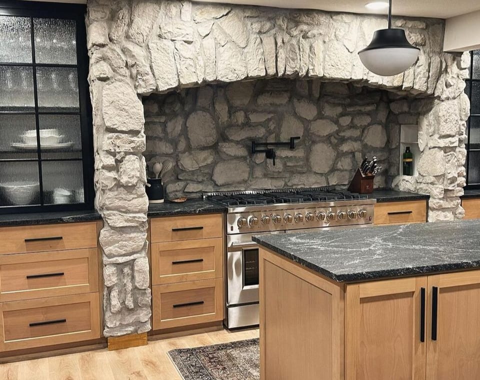 Professional 48” dual fuel range. There are 8 gas burners, two electric ovens. 