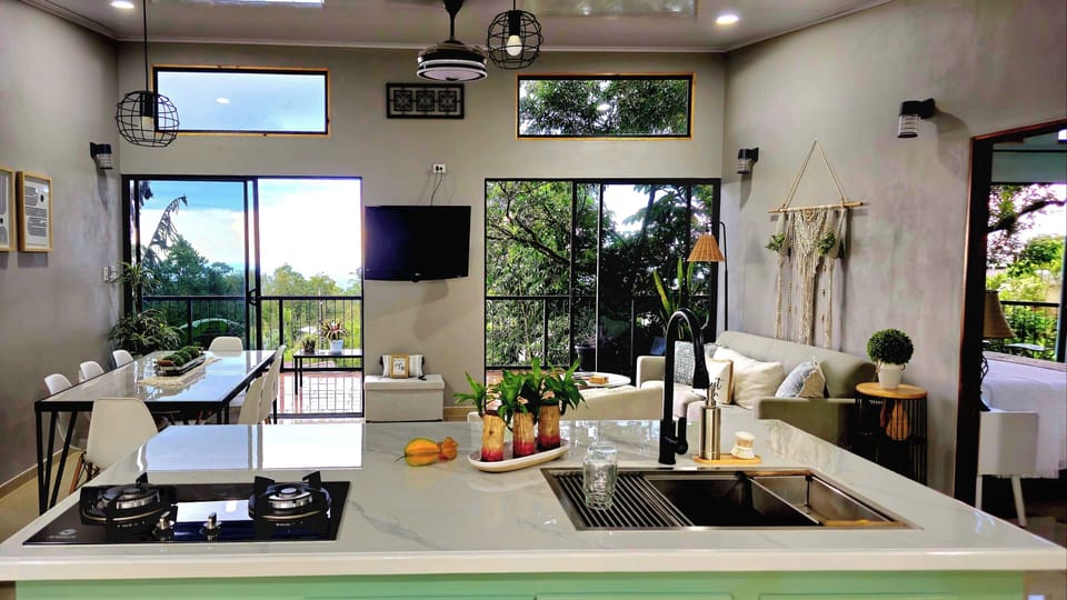 Open concept common area.  Access to balcony thru 2 sliding doors.