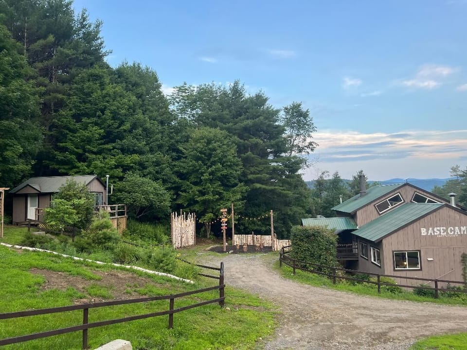 Views of your cabin adjacent to Basecamp Lodge for all amenities.