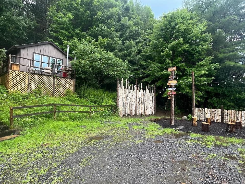 View of your outdoor fire pit in front of Basecamp Lodge common area