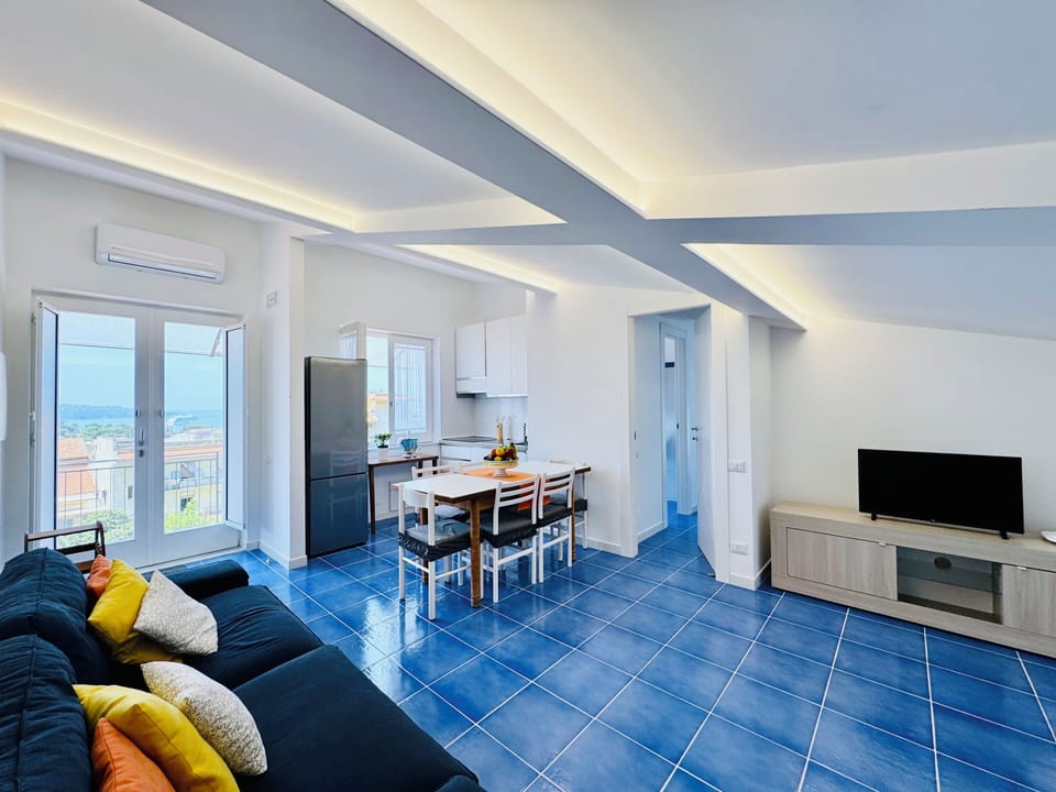 Panoramic Apartment, 3 Bedrooms, Sea View | Living area | 32-inch flat-screen TV with digital channels