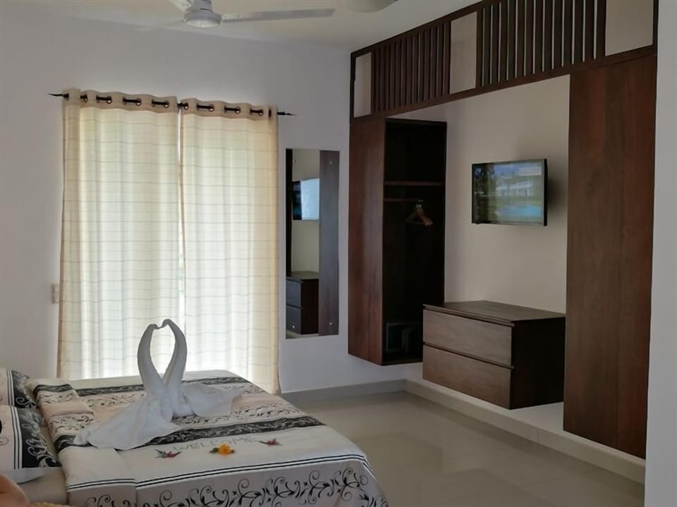 Comfort Room, Resort View | 1 bedroom, in-room safe, desk, laptop workspace