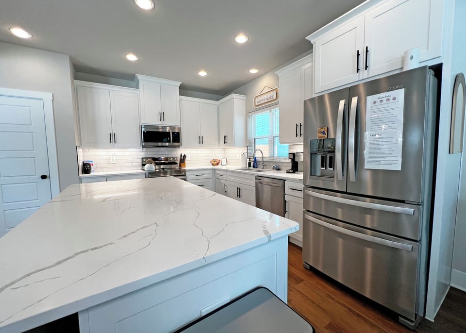 Island for entertaining & French- Door refrigerator with water and ice maker. 