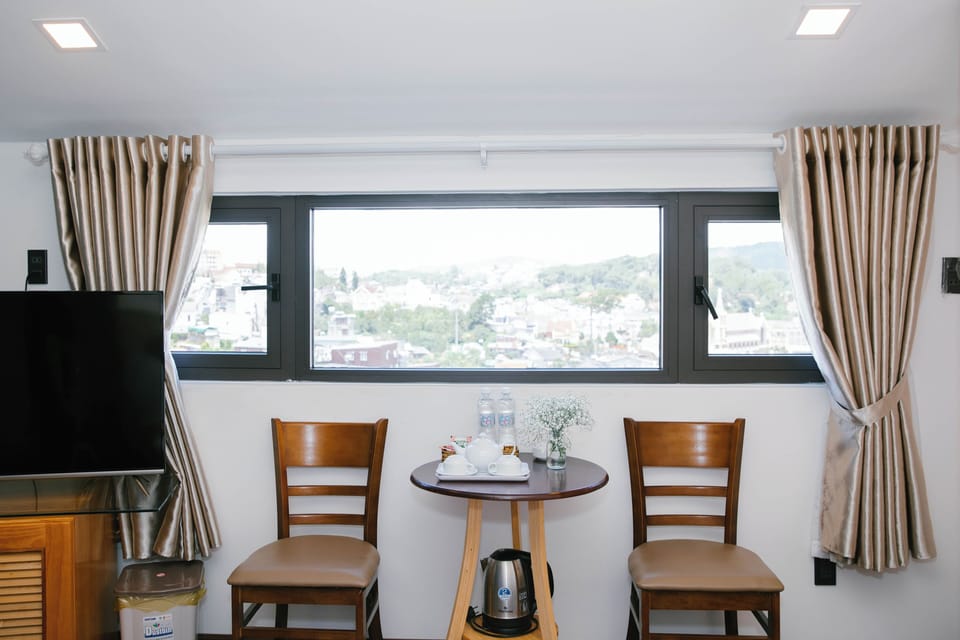 Deluxe Triple Room, City View | Terrace/patio
