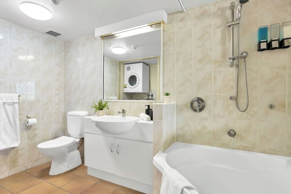 Bathroom with bath/shower. High quality towels and linen provided