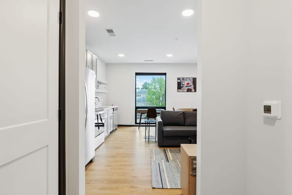 Deluxe Apartment | Living area | 42-inch Smart TV with digital channels