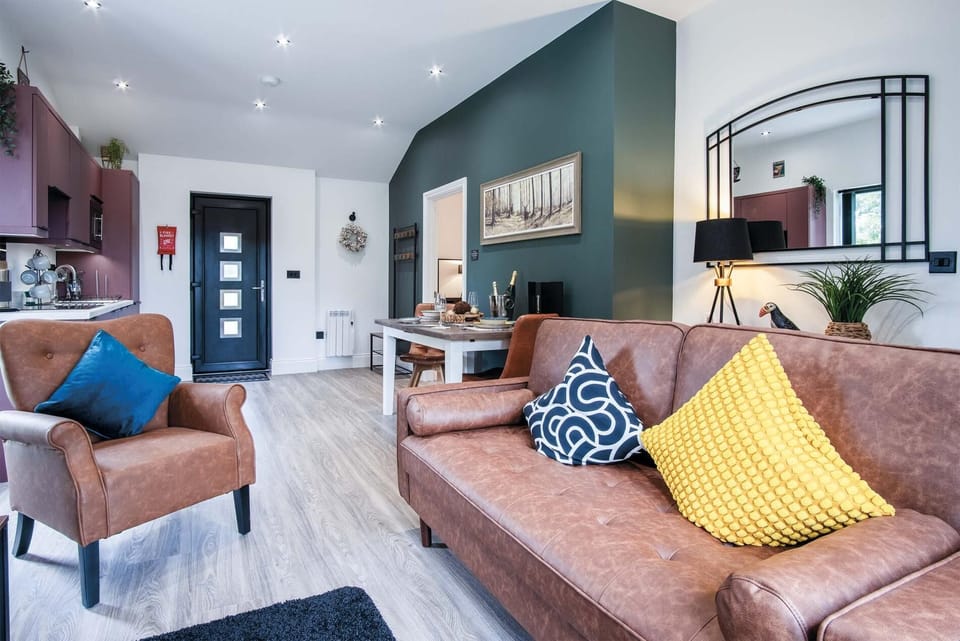 Apartment (1 Bedroom) | Living area | 32-inch Smart TV with cable channels