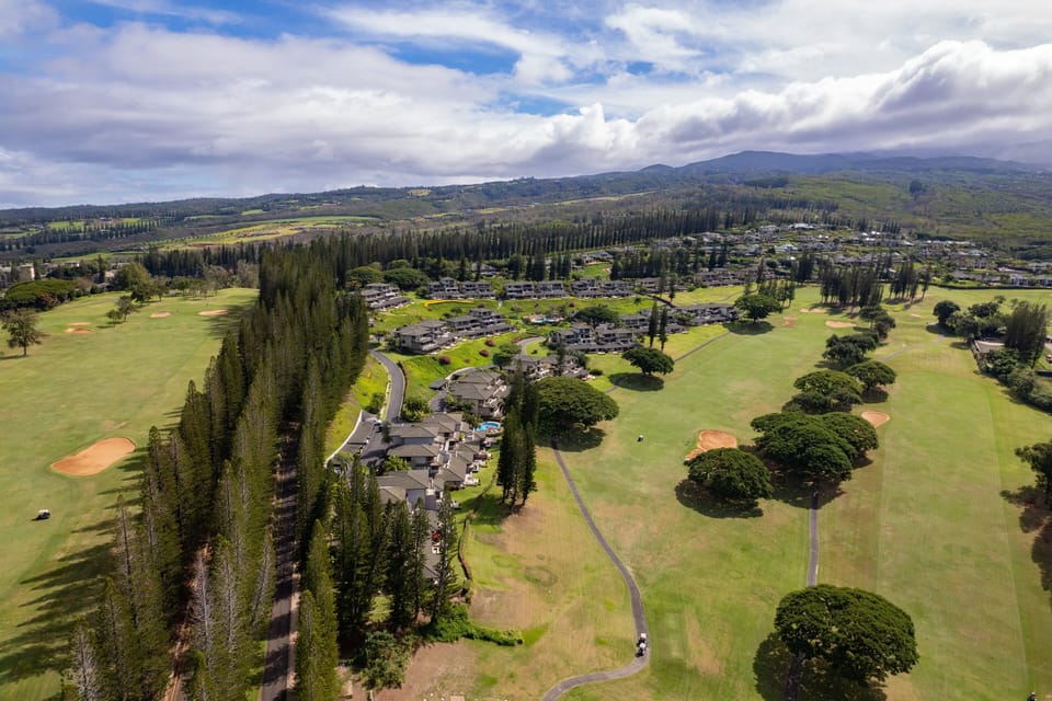 Discover the tranquility of Kapalua Villas, surrounded by pristine golf greens and lush tropical landscapes."