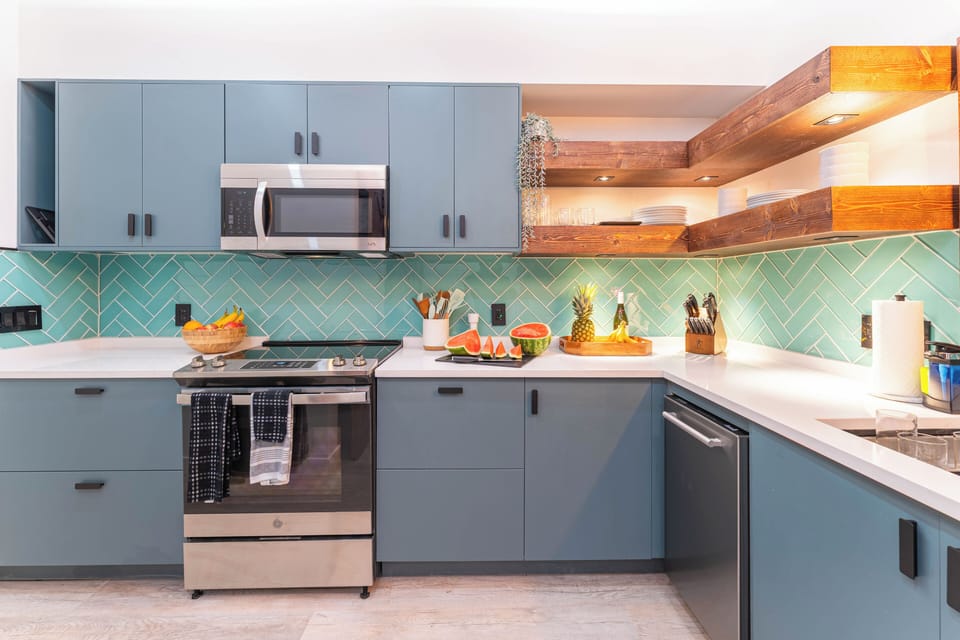 Custom kitchen with honeydew backsplash