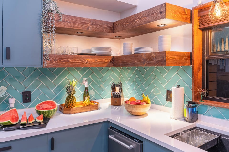 Overbuilt floating shelves with dimmable lighting