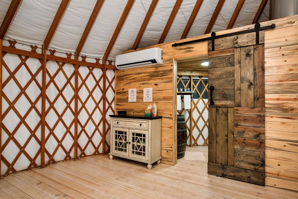 The yurt comes with heat and A/C plus a ceiling fan to help circulate the air.