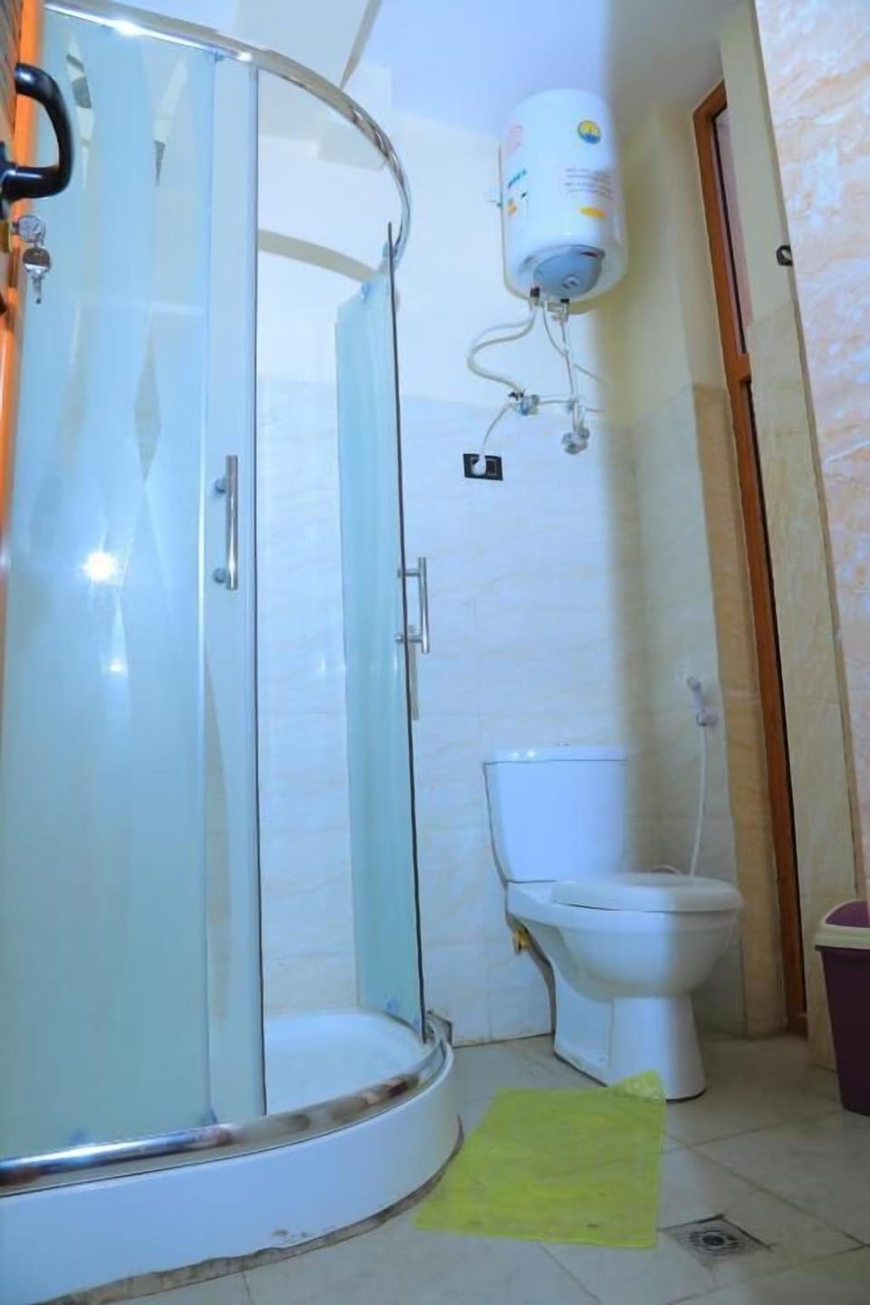 Standard Double Room | Bathroom | Shower, slippers, towels, soap