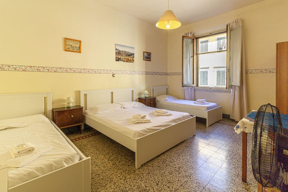 Quadruple Room - Shared Bathroom | Down comforters, desk, laptop workspace, soundproofing