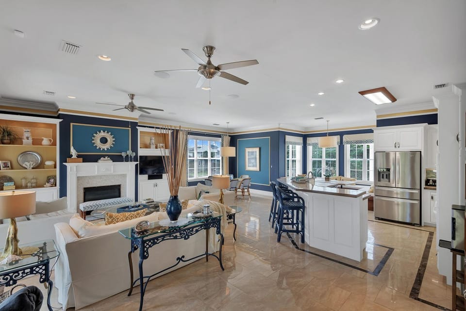 2nd Floor - 🔥 Open-concept kitchen, dining room with lake view, and cozy living room with fireplace