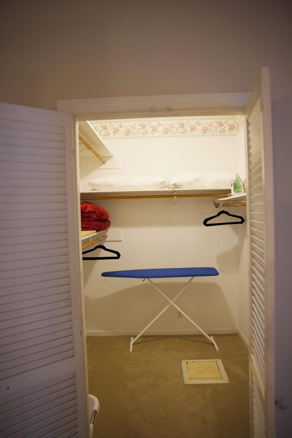 Primary bedroom walk in closet.