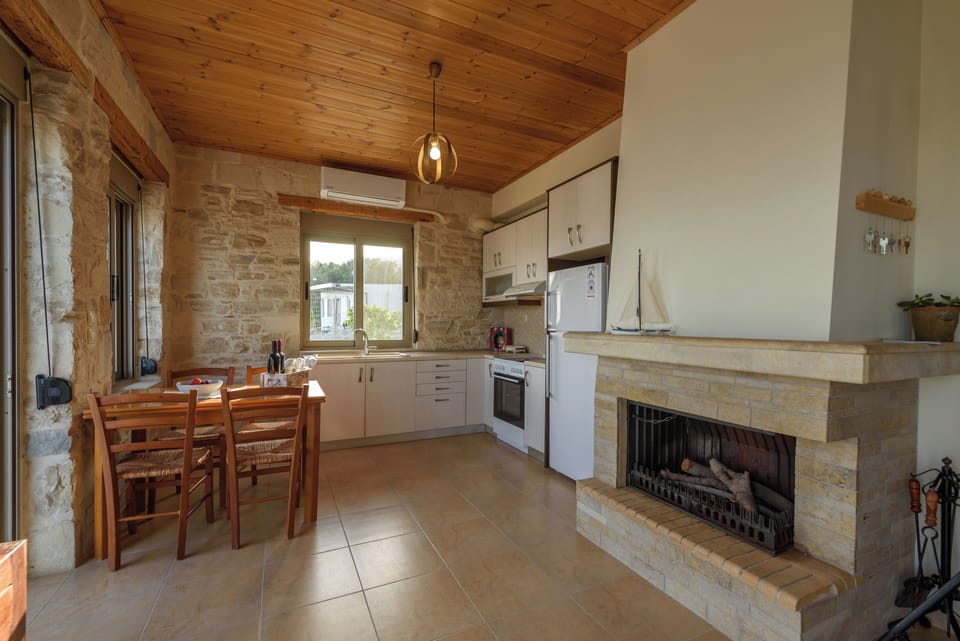 Deluxe Villa | Living area | Flat-screen TV, fireplace