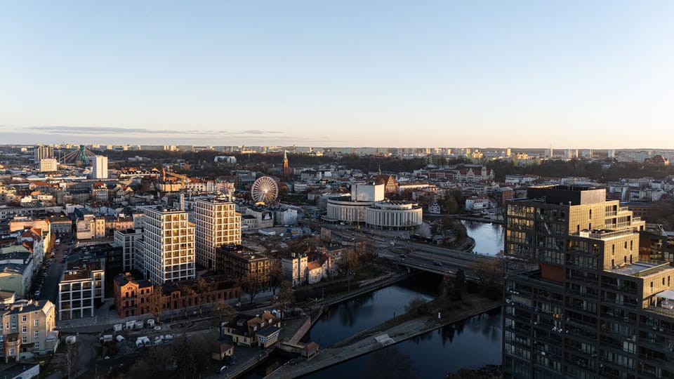 Spectacular panorama of Bydgoszcz city center – apartment close to Old Town, Opera Nova, and Brda river boulevards.