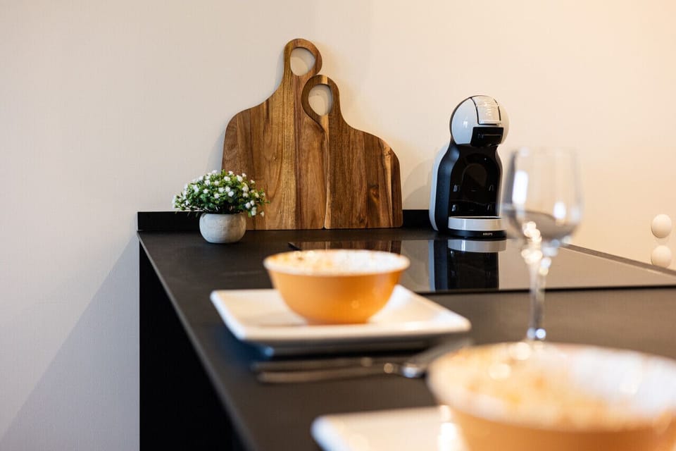 Stylish kitchen – A modern space near Opera Nova, perfect for a morning coffee before exploring Old Market Square and Mill Island.