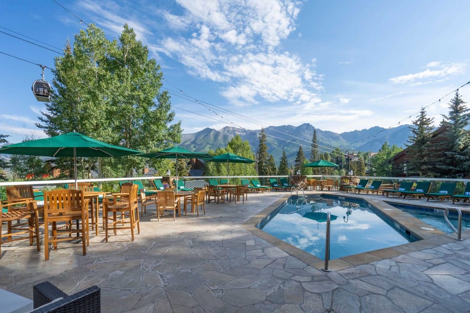 Exterior: Outdoor heated pool, 2 outdoor hot tubs