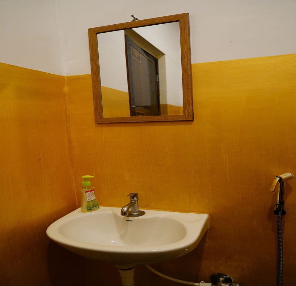 Shower, rainfall showerhead, towels, soap