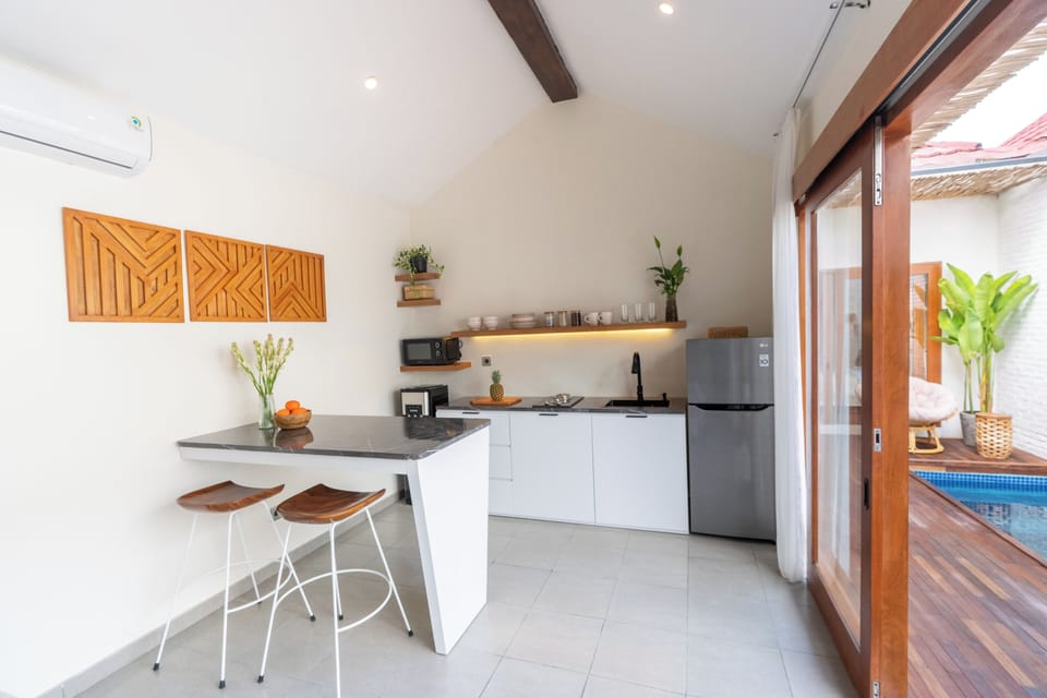 Premium Villa, Pool View | Private kitchen | Full-size fridge, microwave, stovetop, electric kettle