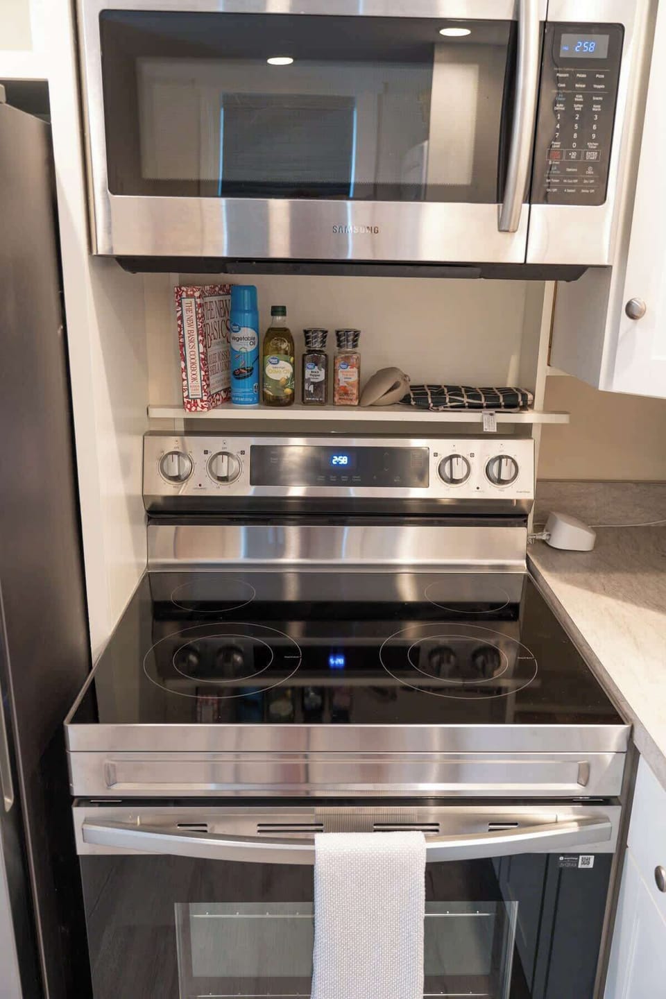 Kitchen with stove and microwave
