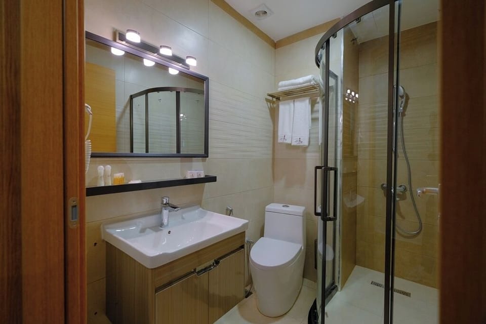 Classic Twin Room, Beach View | Desk, laptop workspace, soundproofing, iron/ironing board